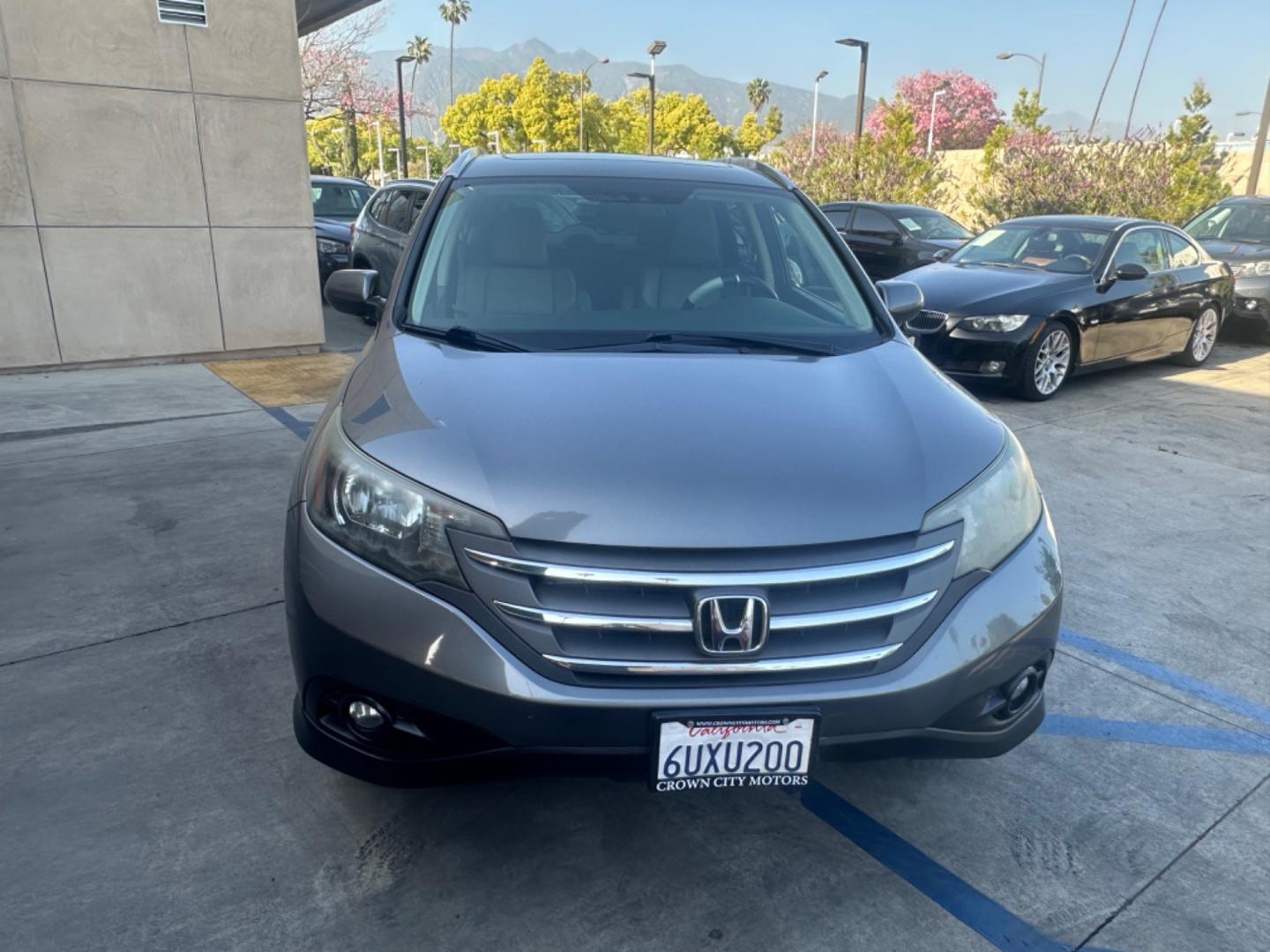 2012 Grey /Gray Honda CR-V EX-L 2WD 5-Speed AT (JHLRM3H78CC) with an 2.4L L4 DOHC 16V engine, 5-Speed Automatic transmission, located at 30 S. Berkeley Avenue, Pasadena, CA, 91107, (626) 248-7567, 34.145447, -118.109398 - Moon-roof! Leather seats! This 2012 Honda CR-V EX-L 2WD 5-Speed AT looks and drives good. - Photo#7